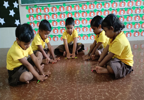 Pencil rolling is a great activity for kindergarten kids to develop their fine motor skills, hand-eye coordination, and dexterity.